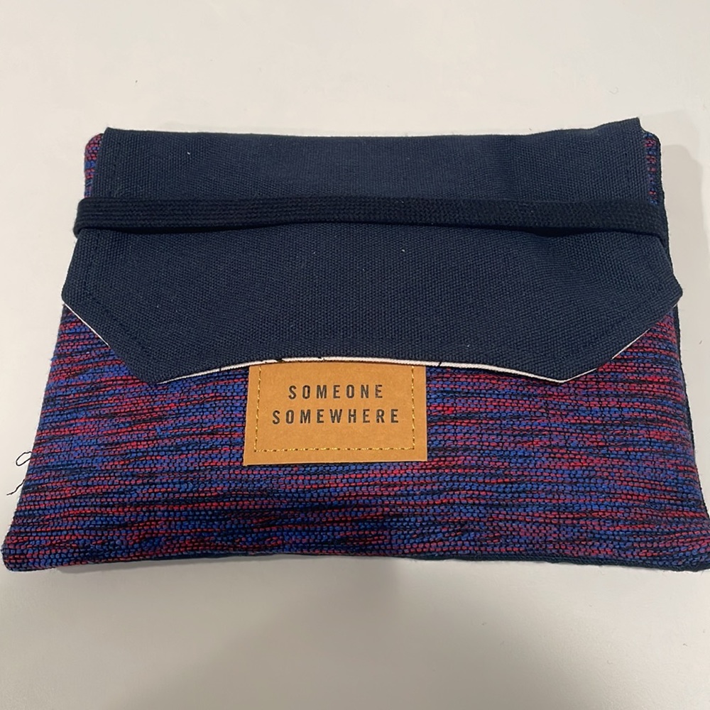 Delta One Someone Somewhere Amenity Kit. Artisan-Made. Red, blue, purple. NWT
